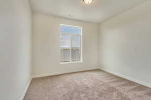 PHOTOS FROM SIMILAR HOME. OPTIONS AND FINISHES WILL VARY. Guest room (bedroom 5) featuring carpet flooring and baseboards