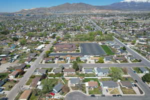 Birds eye view of property featuring a mountain view and a residential view