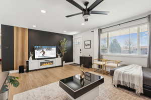 Interior space featuring recessed lighting, baseboards, wood finished floors, and ceiling fan