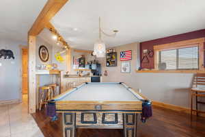 Rec room featuring a wet bar and billiards