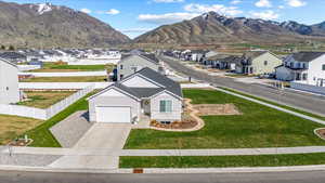 Property view of mountains with a residential view