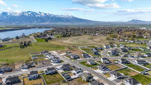 Bird's eye view featuring a water and mountain view