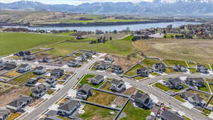 Aerial view featuring a water and mountain view