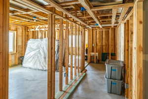 Miscellaneous room featuring concrete floors