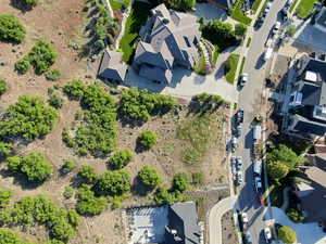 View of property location with nearby suburban area