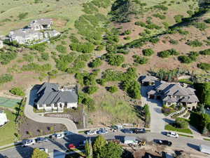 Aerial overview of property's location featuring nearby suburban area