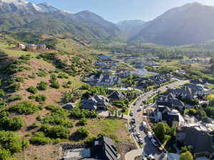 Aerial perspective of suburban area with a mountain backdrop