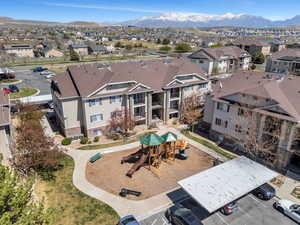 Birds eye view of property featuring a residential view and a mountain view