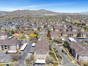 Drone / aerial view with a mountain view and a residential view