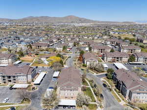 Drone / aerial view featuring a mountain view and a residential view