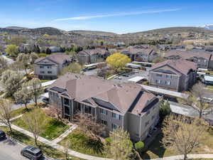 Drone / aerial view with a mountain view and a residential view