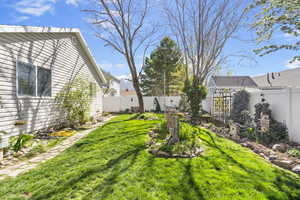 View of yard with a fenced backyard