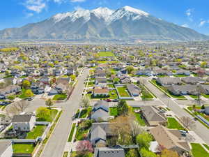 Birds eye view of property featuring a mountain view and a residential view
