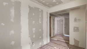 Hallway featuring wood finished floors