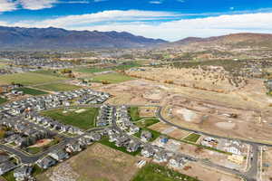 View of property location with nearby suburban area and a mountain backdrop