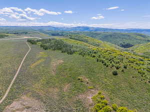 Drone / aerial view of a mountain backdrop