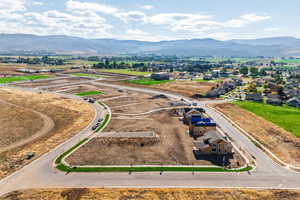 Aerial perspective of suburban area featuring mountains