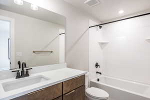 Bathroom featuring shower / bathtub combination and vanity