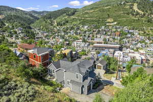 Aerial view featuring a mountain view and a residential view