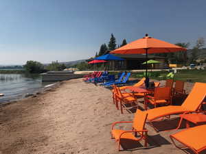 View of home's community with a water view