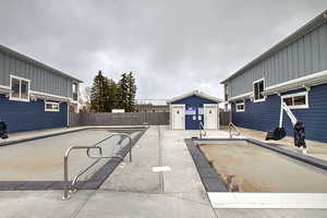 View of pool featuring fence