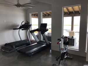 Exercise area featuring lofted ceiling