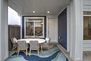View of patio featuring outdoor dining area