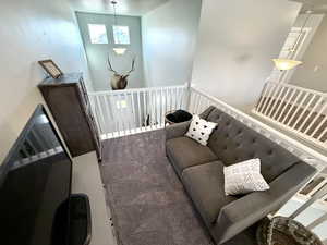 Living space with a view of both the entry and great room.