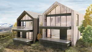Back of house with a balcony