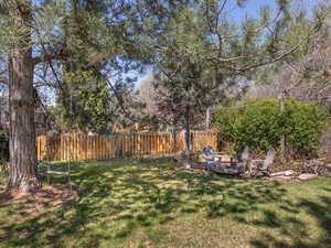 View of yard with fence