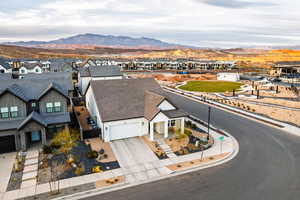 Birds eye view of property with a residential view and a mountain view