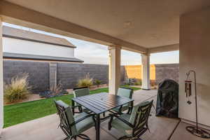 View of patio / terrace with a fenced backyard and outdoor dining area
