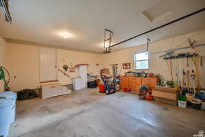 Garage featuring a garage door opener