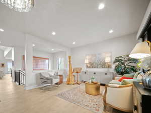 Den featuring recessed lighting,