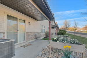 View of patio featuring central AC