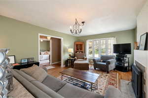 Oak floors are featured in the living room, dining area and front guest room.