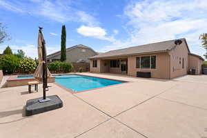 View of swimming pool with a fenced in pool, a patio, a fenced backyard, and cooling unit