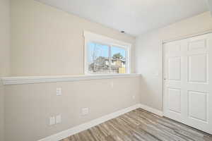 Bright and fresh main floor bedroom.