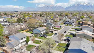 Drone / aerial view featuring a mountain view and a residential view