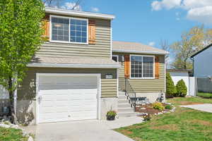 Brand new exterior paint.  Brand new garage door w/new opener.