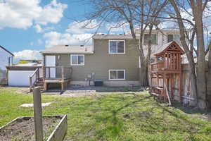 Fun, fenced yard with a play gym.