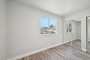 Primary bedroom with lots of natural light.