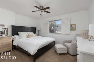 Bedroom with carpet and a ceiling fan
