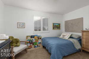 View of carpeted bedroom