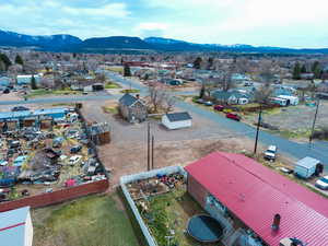 Drone / aerial view with a mountain view and a residential view