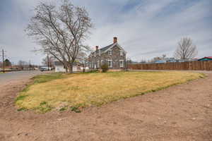View of yard with fence