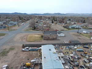 Birds eye view of property featuring a residential view and a mountain view