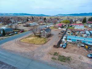 Birds eye view of property with a mountain view