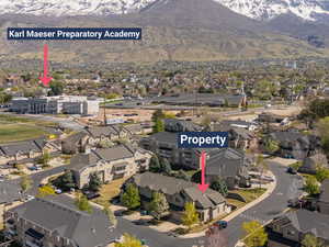 Aerial view featuring a mountain view and a residential view