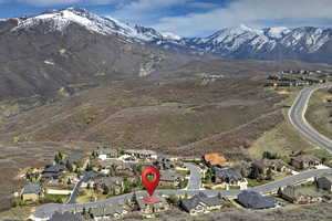 Drone / aerial view featuring a residential view and a mountain view